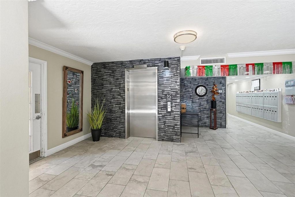 Photo of 2601 S Course Drive #202, Pompano Beach, FL 33069 (MLS # F10544419)