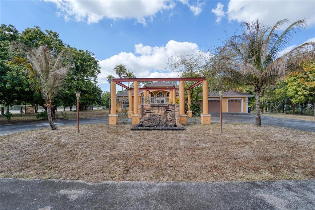 Photo of 4001 Avocado Boulevard, West Palm Beach, FL 33411 (MLS # R11163367)