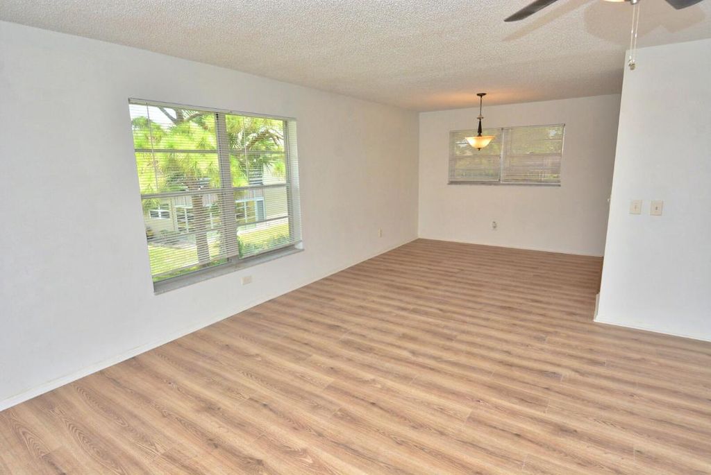 Photo of 11 Lake Vista Trail #207, Port Saint Lucie, FL 34952 (MLS # R10904945)