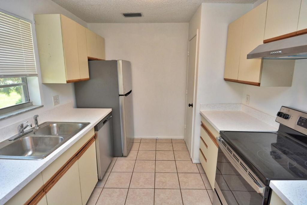 Photo of 11 Lake Vista Trail #207, Port Saint Lucie, FL 34952 (MLS # R10904945)