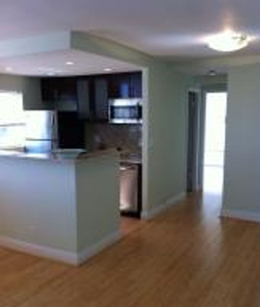 Location, Location, Location! Best kept secret in Boynton Beach. Apartment has been completely renovated with gorgeous bamboo wood floors, granite counters, stainless steel appliances and a beautiful new bathroom with seamless glass shower door. Top floor unit with a spacious balcony off master suite. Freshly painted unit with nice neutral colors. Close to I-95, shopping, restaurants, Intracoastal and the Beach. Entire apartment has been remodeled from floors to ceiling. Shows like a model. Nothing to do. Move in condition.SORRY NO PETS ALLOWED.