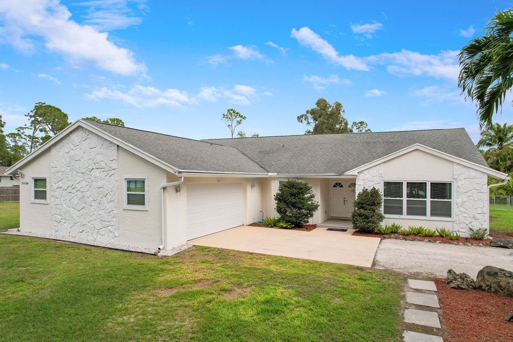 Photo of 5486 Avocado Boulevard, The Acreage, FL 33411 (MLS # R10957049)