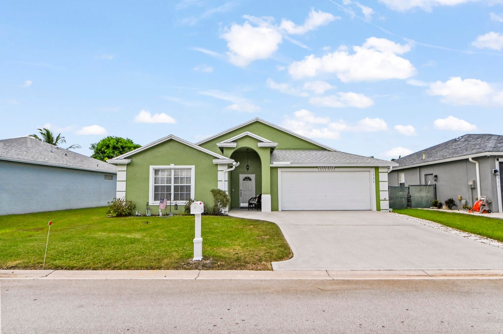 Photo of 1324 Cape May Lane, Greenacres, FL 33413 (MLS # B26074146)