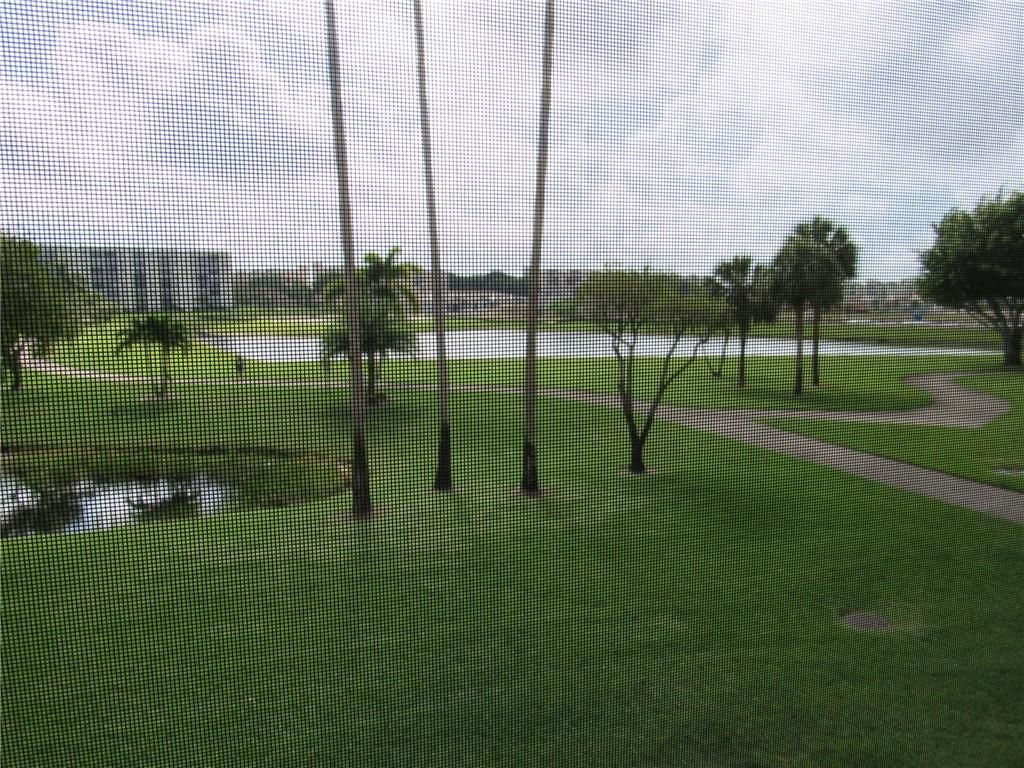 Photo of 7006 Huntington Ln #208, Delray Beach, FL 33446 (MLS # F10323458)