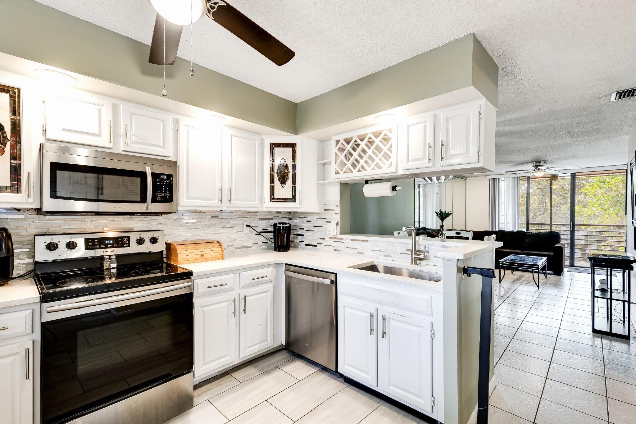 Spacious 2 br / 2 bath in the gated community of Bonaire at Woodmont in Tamarac, next to the Woodmont Country Club. Penthouse level, third floor near elevator. Tile/laminate/wood floors. Plenty of guest parking. 1 pet / 25 lb max. No rentals. Mailbox conveniently located next to elevator. Peaceful screened patio with sliding glass & tile w/ beautiful views of greenery and 1 of 2 swimming pools. Full size washer/dryer. No assessments. Association req 12 months of HOA in escrow for first 36 months; Then returned. Monthly HOA $740 (2025) incl water, sewer, trash, cable, 1 assigned parking (addl available), amenities: 2 pools, saunas, hottubs, community room, bbq area, bike storage. Minutes to Coral Square Mall, parks, grocery stores, restaurants, shopping along University Drive & elsewhere
