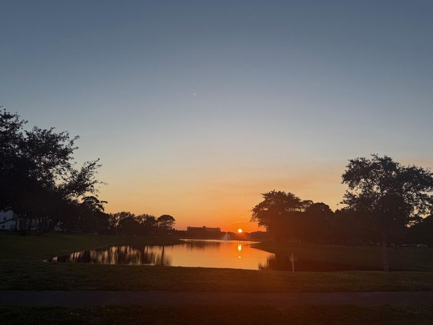 Beautiful condo with stunning lake views! Enjoy breathtaking sunsets over the lake every evening from this spacious, elegant unit. The gorgeous kitchen features glass-front cabinets, stainless steel appliances, and a beautiful granite countertop, showcasing a modern, refined design throughout the home. Both bathrooms have been remodeled, offering a luxurious feel. The unit also features a large screened-in balcony, perfect for relaxing and taking in the views. The bathrooms are gorgeous, and newly remodeled. Tons of closets too. This is a must see condo! Come view it before its gone!