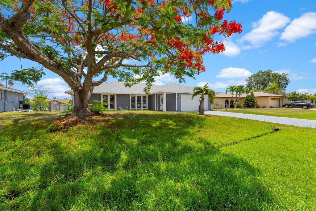 Photo of 1991 SW Gemini Lane, Port Saint Lucie, FL 34984 (MLS # R11167742)