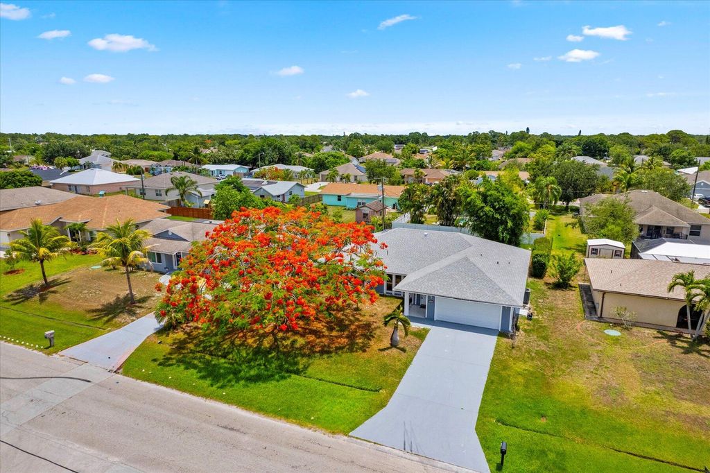 Photo of 1991 SW Gemini Lane, Port Saint Lucie, FL 34984 (MLS # R11167742)