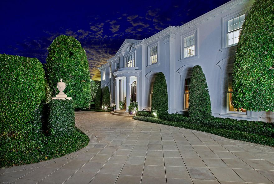 Maybe the prettiest house in Palm Beach!  Incredible gardens.  Elegance and beauty everywhere! Set high on a hill dramatically looking like the famous ''White House''.  Soaring ceilings and a winding staircase. Large doubled study/den with fine wood paneling! 6 bedrooms, 7 and 1/2 baths, and a dining room fit for a King with kitchen for gourmet chef. Floor to ceiling windows and a pool located on 1/2 acre of absolute perfection!