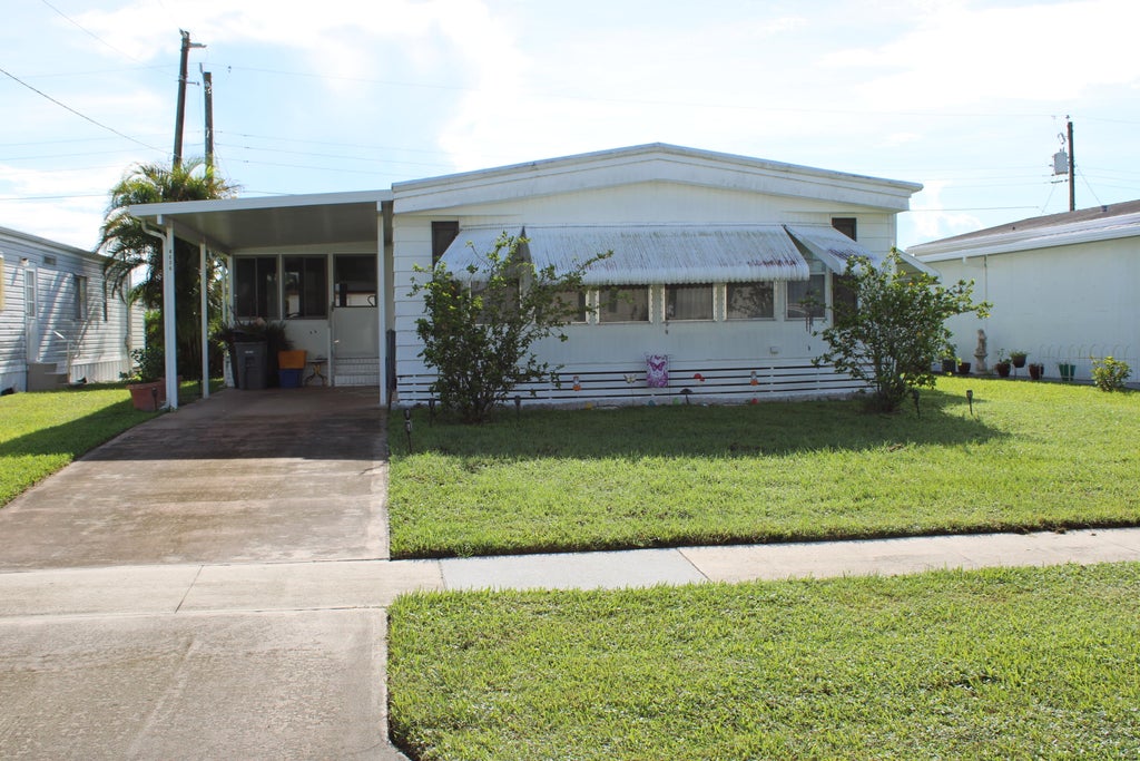 Photo of 4034 SANDPINE Circle, Boynton Beach, FL 33436 (MLS # B26073887)