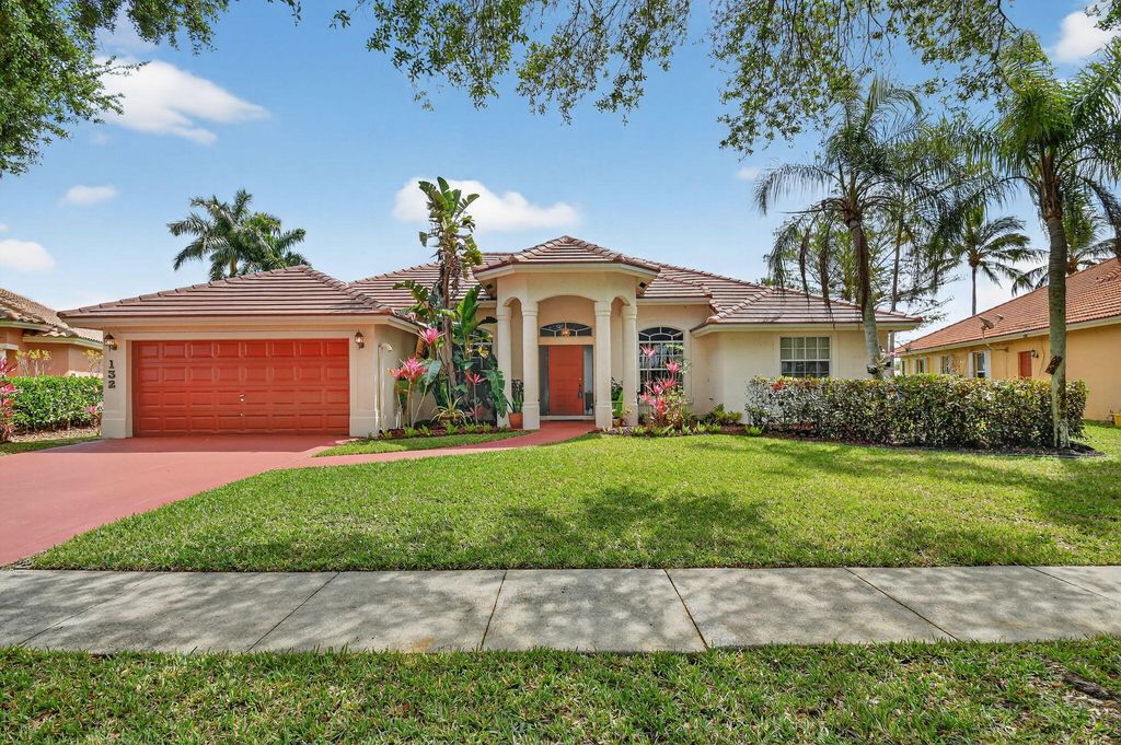 Photo of 132 Kapok Crescent, Royal Palm Beach, FL 33411 (MLS # B26007987)