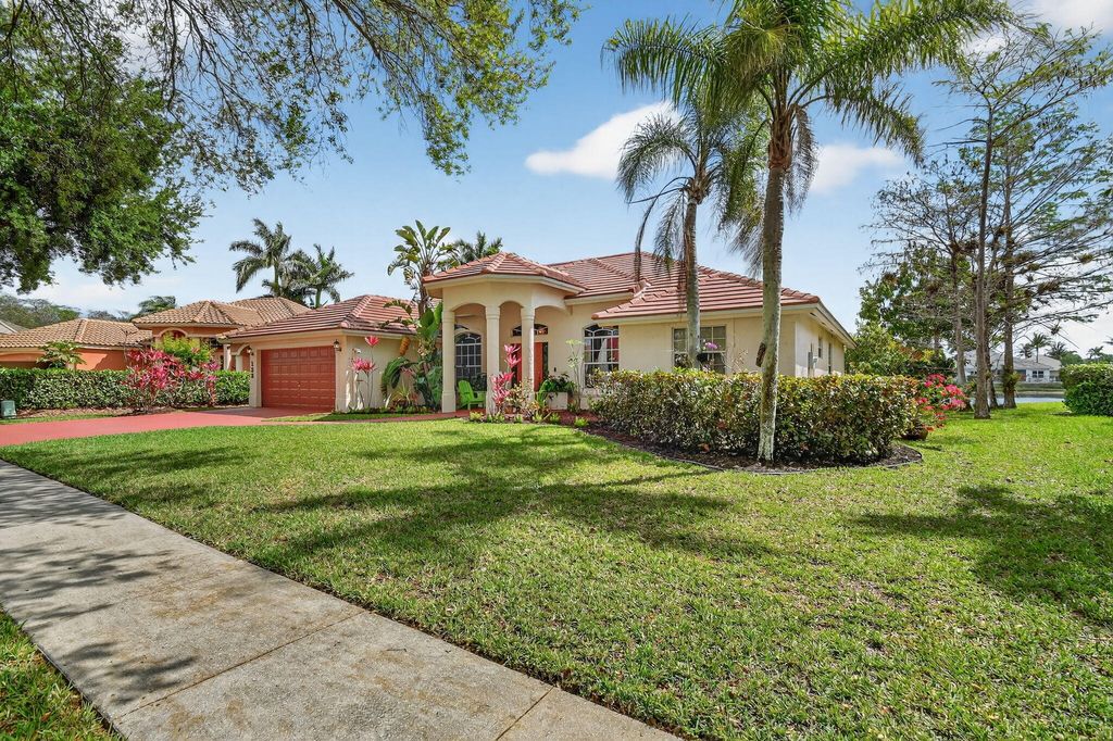 Photo of 132 Kapok Crescent, Royal Palm Beach, FL 33411 (MLS # B26007987)