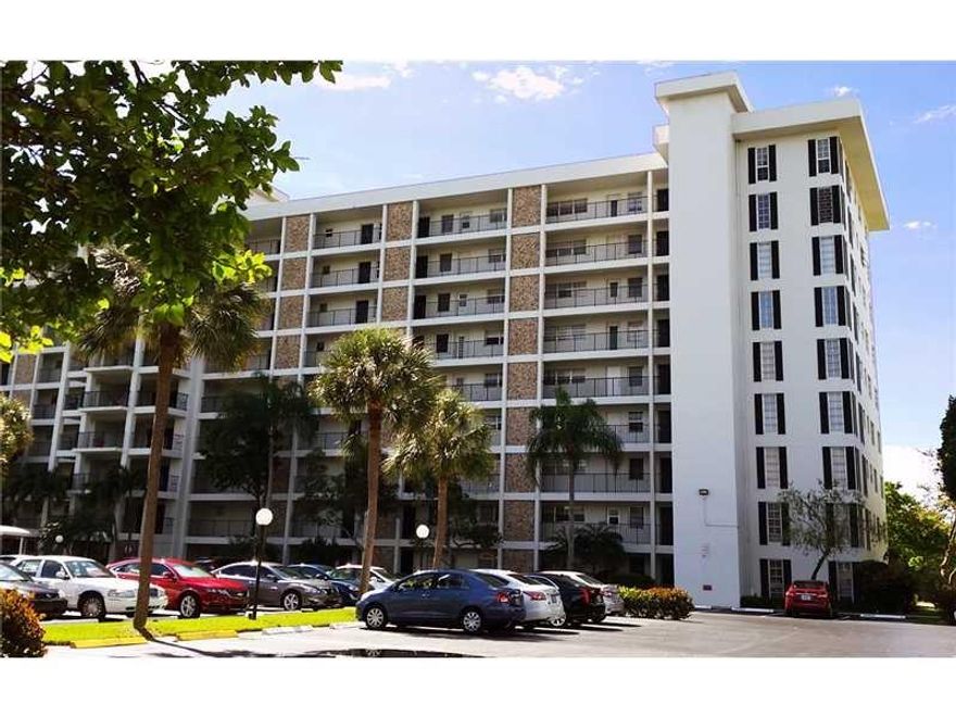 SPACIOUS, UPDATED CONDO WITH REMODELED KITCHEN IS AVAILABLE IN THE DESIRABLE PALM AIRE COUNTRY CLUB!! BEAUTIFUL GOLF COURSE VIEWS! EAT-IN KITCHEN WITH BUILT-IN GRANITE TABLE, UPGRADED BATHROOMS,  TASTE FULLY FURNISHED, WALK-IN CLOSET, AND LOTS OF STORAGE.GREAT VIEWS FROM THE BEAUTIFUL TILED, SCREENED IN BALCONY. YOU WILL HAVE ACCESS TO GREAT WALKING/BIKE PATHS,TENNIS COURTS AND POOL!,. ALL AGES WELCOME,  CONVENIENT BEACHES, TO I-95, TURNPIKE AND RESTAURANTS. THIS IS A MUST SEE!!!