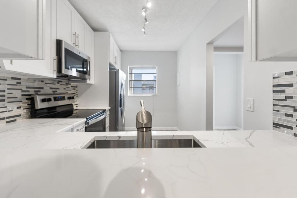 Photo of 2800 SW 22nd Avenue #1060, Delray Beach, FL 33445 (MLS # R11049270)