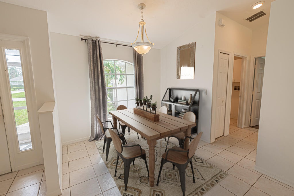 Photo of 1782 SW Brisbane Street, Port Saint Lucie, FL 34984 (MLS # R11108580)