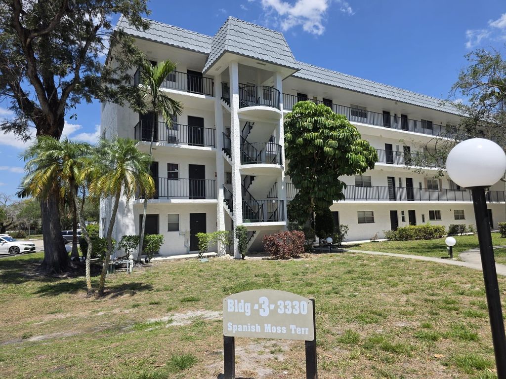 Photo of 3330 Spanish Moss Ter #113, Lauderhill, FL 33319 (MLS # F10533101)