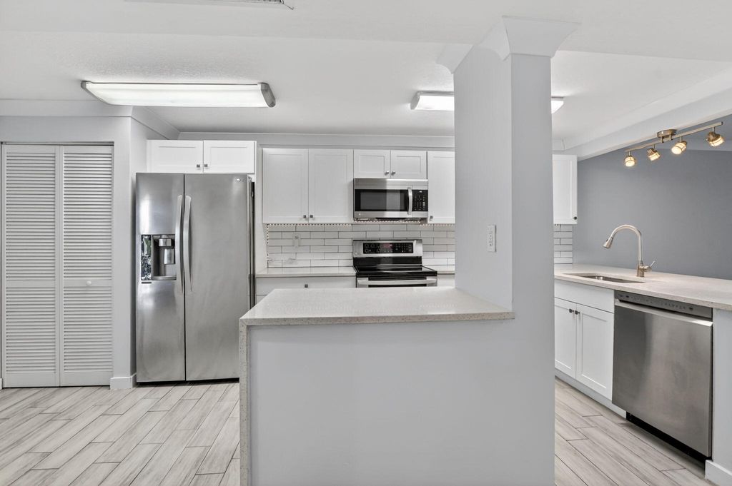 Photo of 8 Royal Palm Way #203, Boca Raton, FL 33432 (MLS # B26023541)
