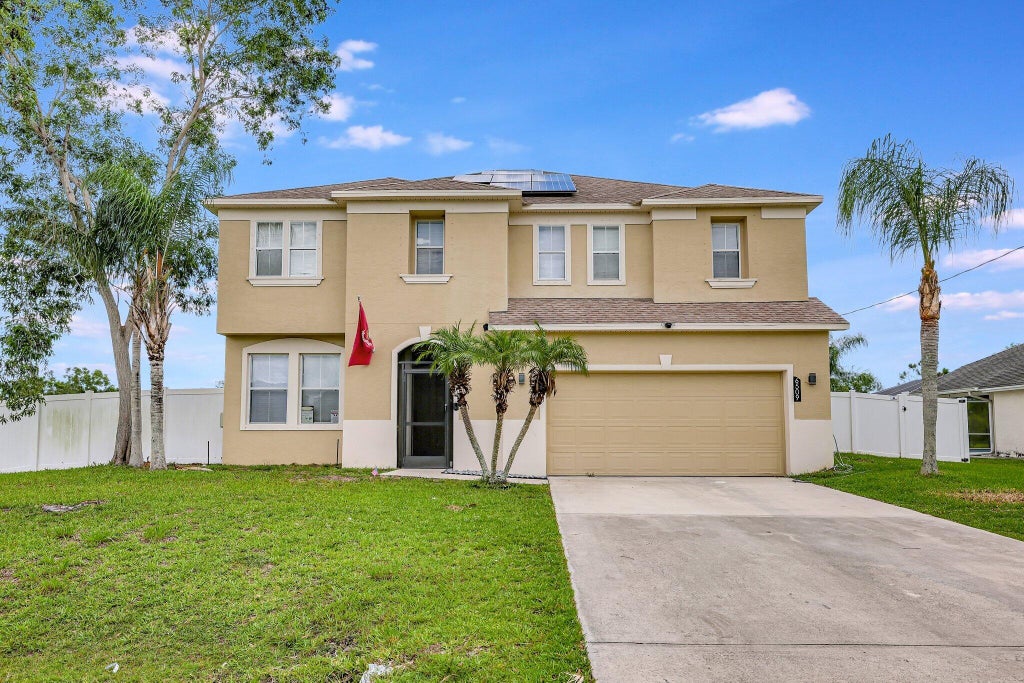 Photo of 6509 NW OMEGA Road, Port Saint Lucie, FL 34983 (MLS # B26067912)