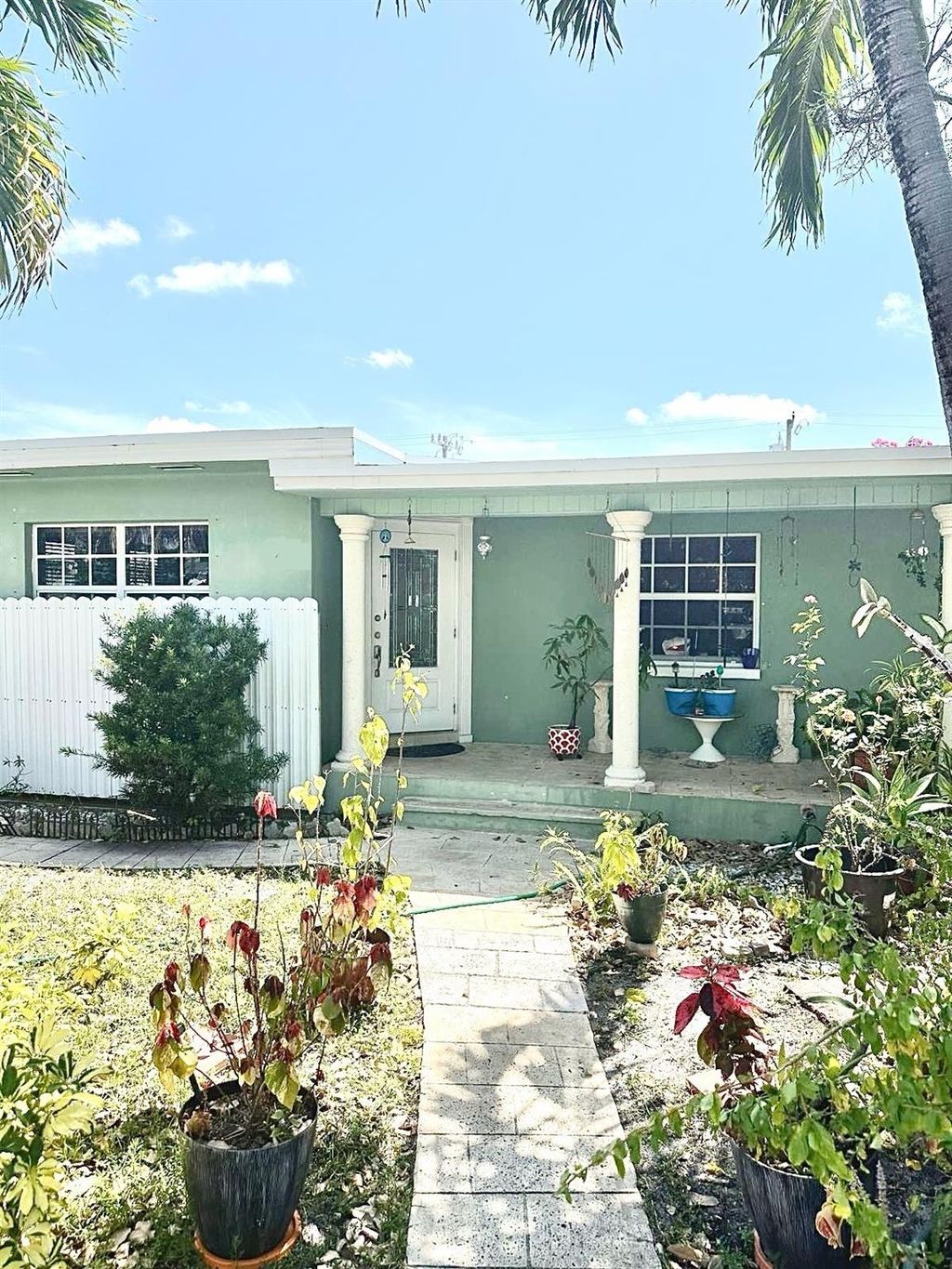 Photo of 1126 N H Street, Lake Worth Beach, FL 33460 (MLS # F10501288)