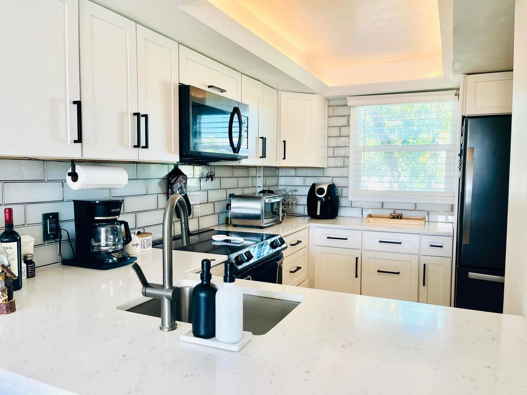 Photo of 111 Royal Park Drive #3e, Oakland Park, FL 33309 (MLS # B26020664)