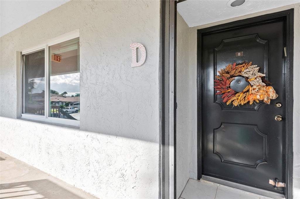 Photo of 5749 Phoenix Palm Court #D, Delray Beach, FL 33484 (MLS # F10407600)