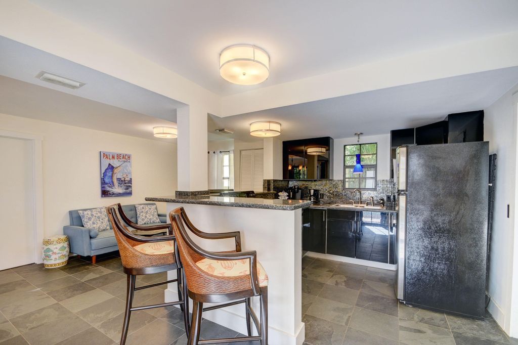 Photo of 713 Sunset Road, West Palm Beach, FL 33401 (MLS # B26020859)