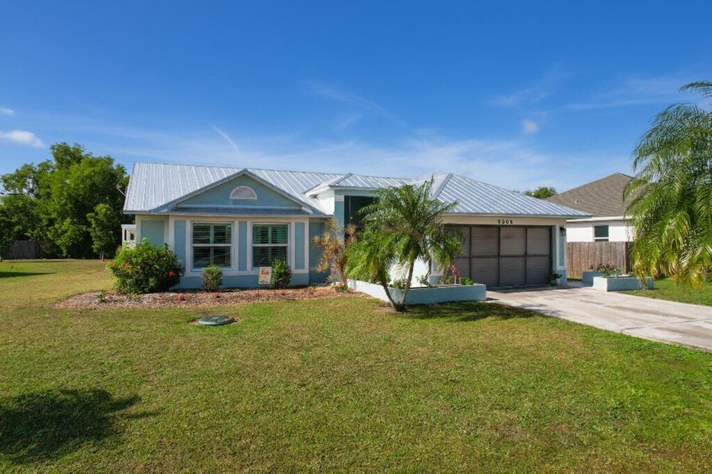 Photo of 2366 SE Beechwood Terrace, Port Saint Lucie, FL 34952 (MLS # R11156997)