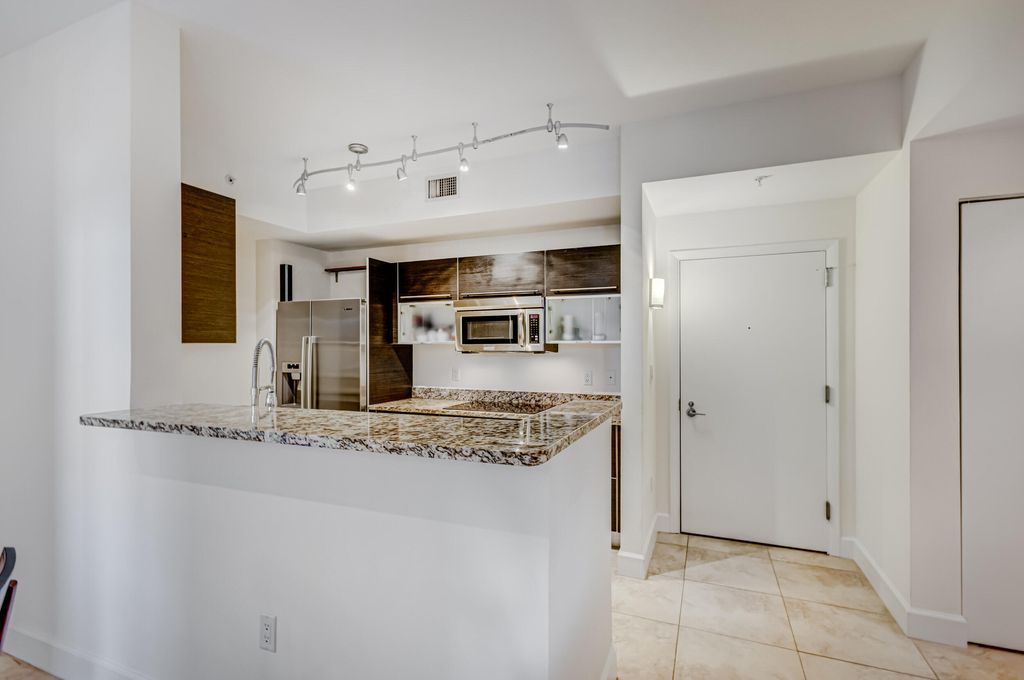 Photo of 550 Okeechobee Boulevard #406, West Palm Beach, FL 33401 (MLS # B26015459)