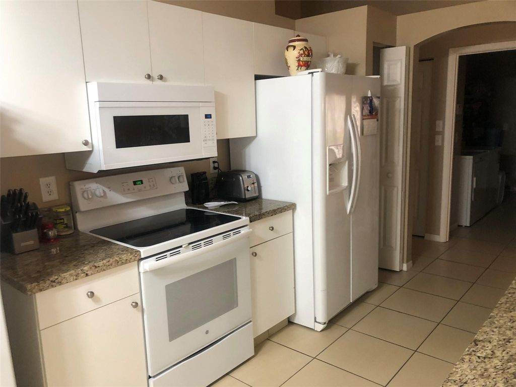 Photo of 4703 NW 75th Place, Coconut Creek, FL 33073 (MLS # F10415817)