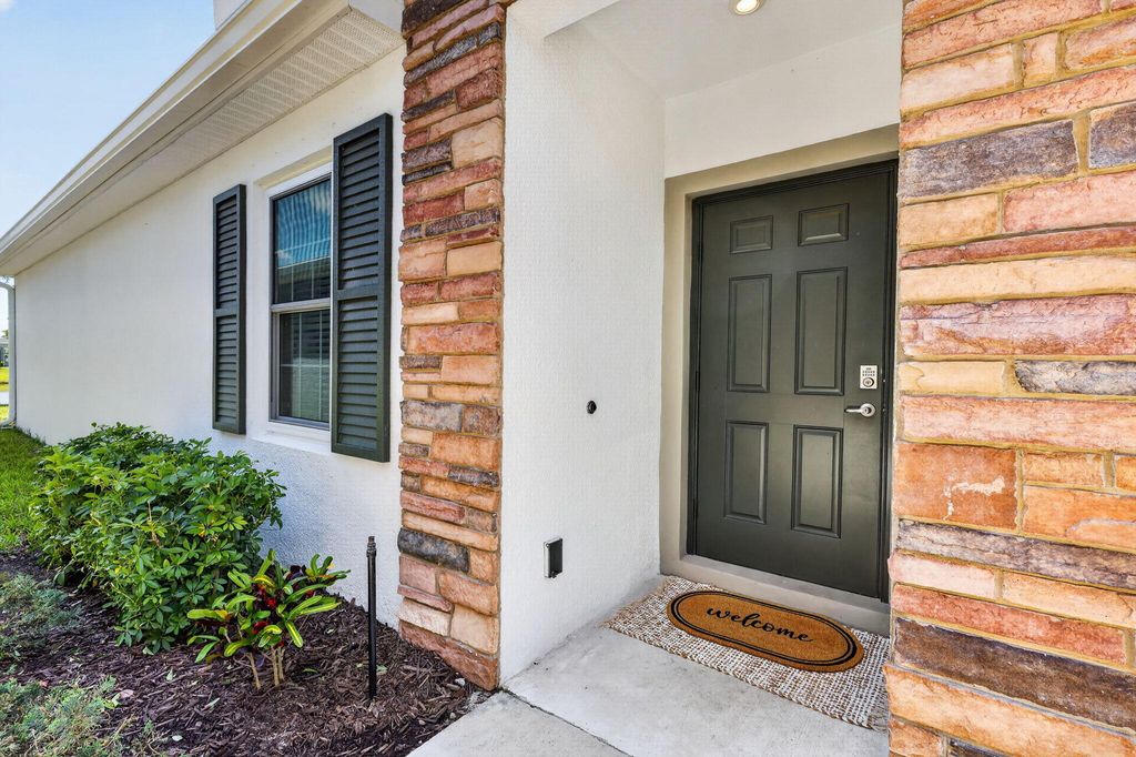 Photo of 9401 SW Libertas Way, Port Saint Lucie, FL 34987 (MLS # B26017651)