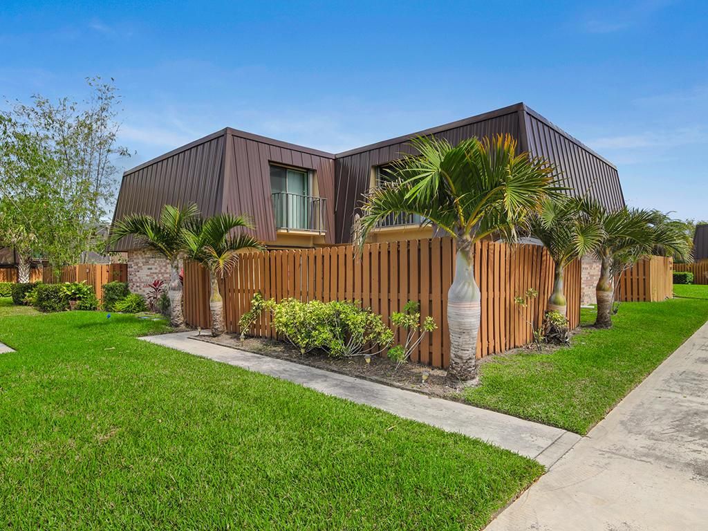 Photo of 5752 SE Windsong Lane, Stuart, FL 34997 (MLS # R10693584)