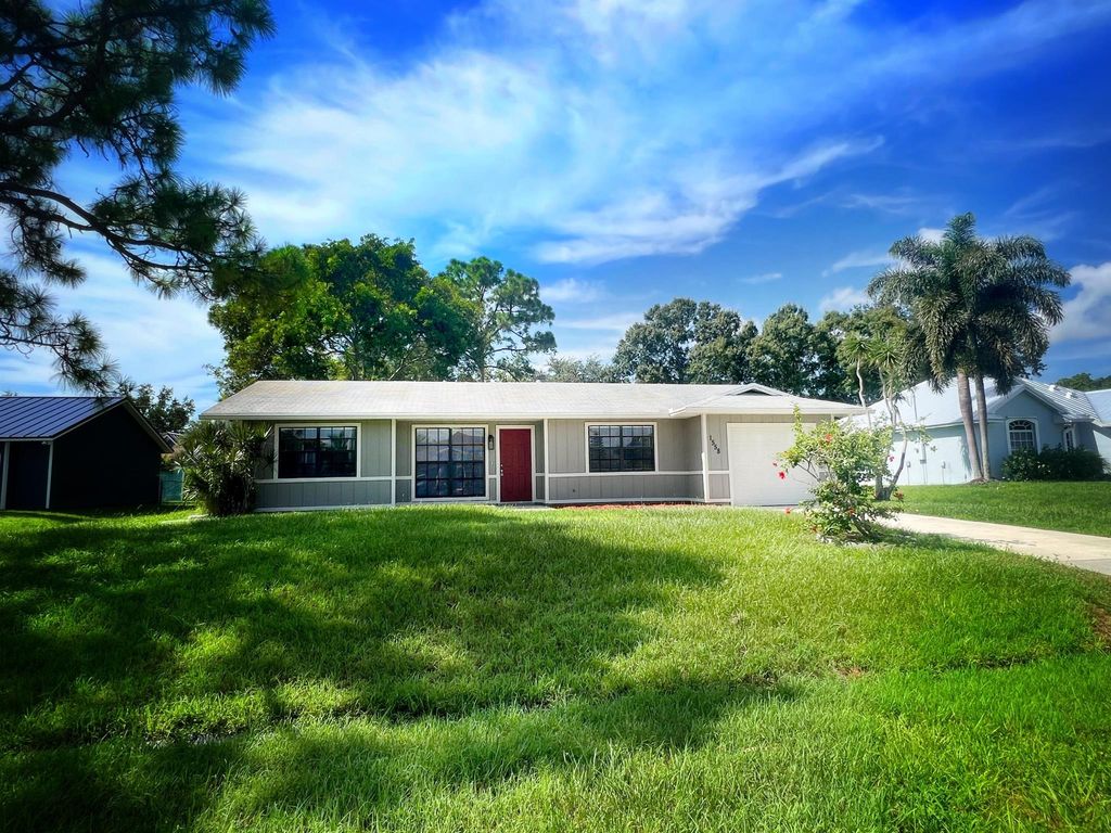 Photo of 1558 SW Silver Lane, Port Saint Lucie, FL 34953 (MLS # R11012368)