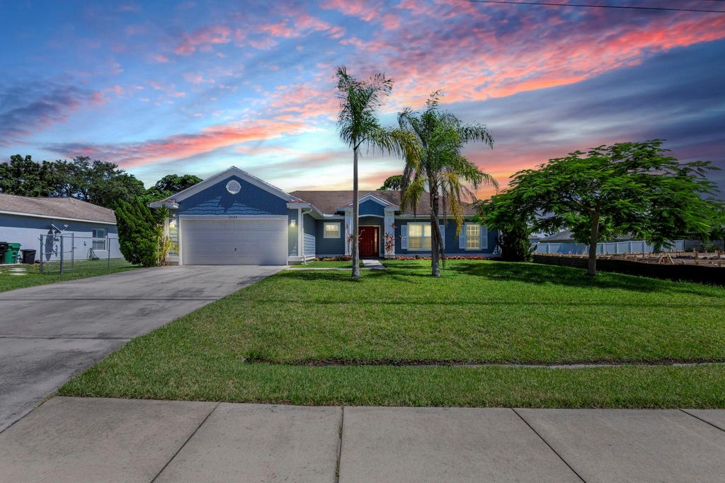 Photo of 2444 SE Melaleuca Boulevard, Port Saint Lucie, FL 34952 (MLS # F10451540)