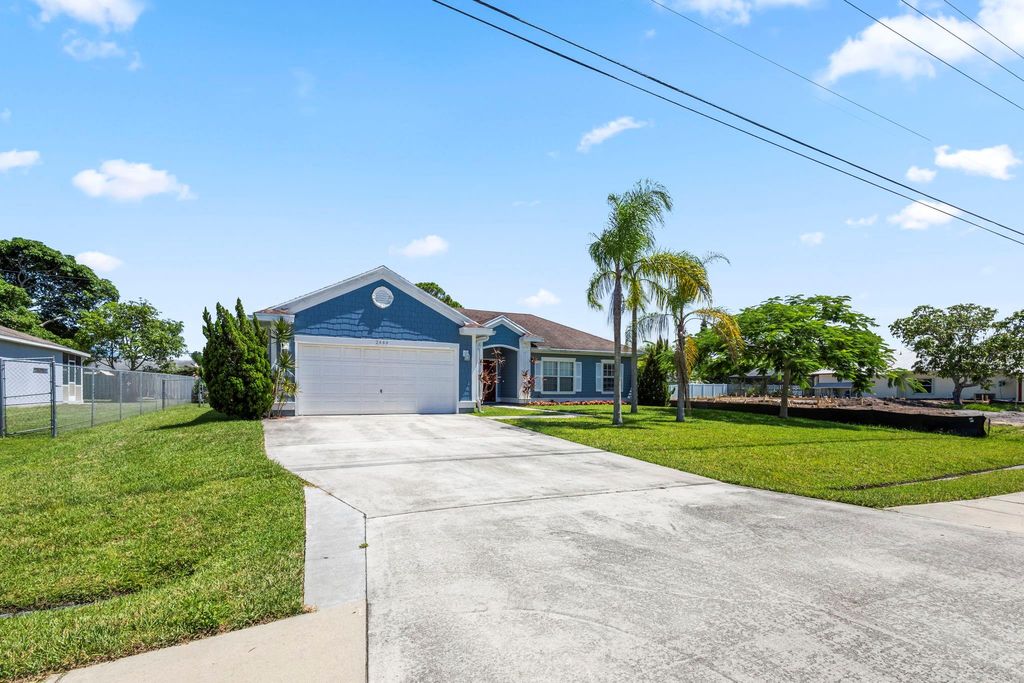Photo of 2444 SE Melaleuca Boulevard, Port Saint Lucie, FL 34952 (MLS # F10451540)