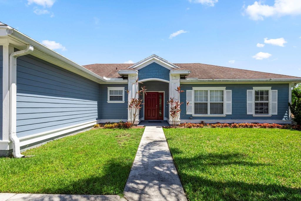Photo of 2444 SE Melaleuca Boulevard, Port Saint Lucie, FL 34952 (MLS # F10451540)