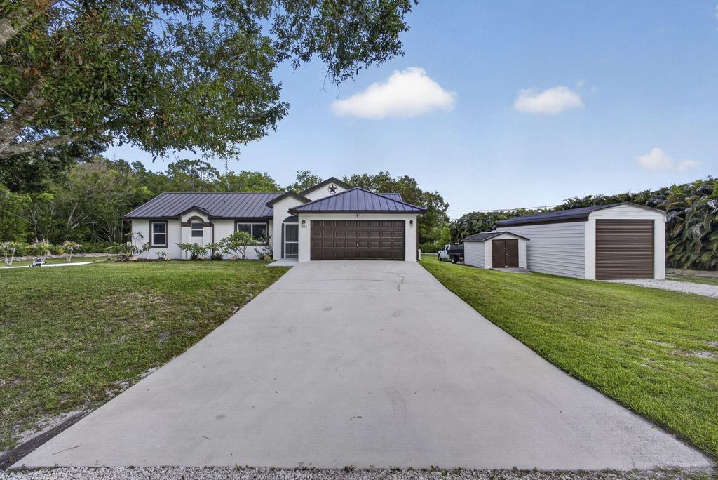 Photo of 12783 83rd Lane N, West Palm Beach, FL 33412 (MLS # B26035645)