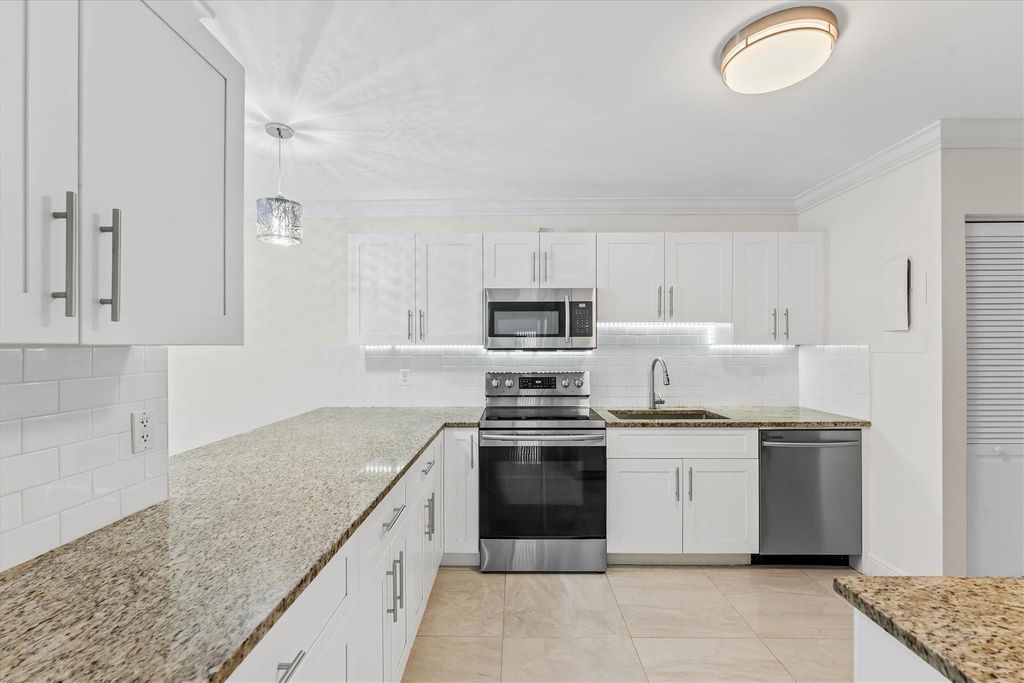 Photo of 4741 Holly Lake Drive, Lake Worth, FL 33463 (MLS # F10527929)