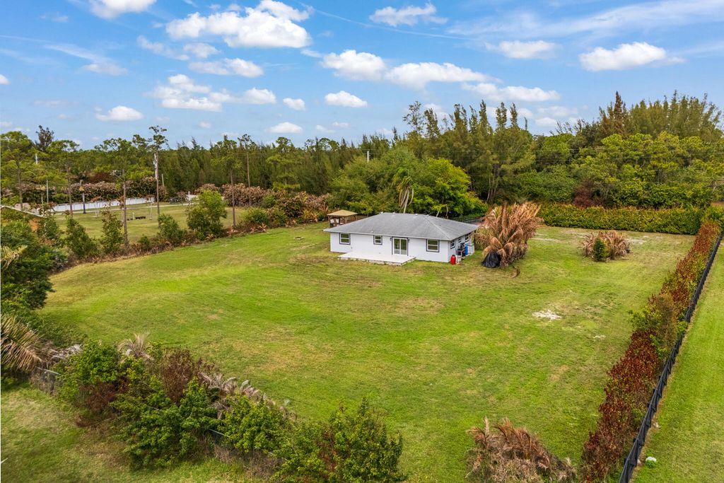 Photo of 12316 Orange Boulevard, West Palm Beach, FL 33412 (MLS # B26001261)