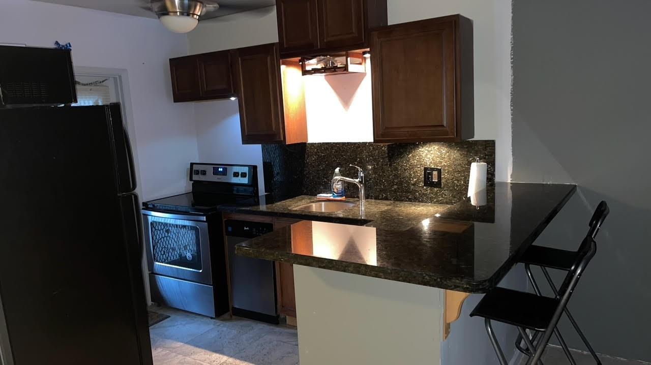 Cute, updated 1-bed, 1.5-bath 3rd-floor condo with pool view. Open kitchen features Granite countertops, wood cabinetry, updated appliances. Saturnia tile flooring. LLots of closets. NEW roof, new water heater, new electrical panel, AC 4 years old. Structural recertification complete. $452 Monthly maintenance covers exterior insurance, water, garbage, pest control, landscaping. Hillcrest has 4 pools, tennis/pickleball, gym, clubhouse. Association requires 20% down, 700+ credit, $65K income, Debt/Income ratio<30%. No pets. No rentals. No age restrictions. Centrally located between the Hard Rock hotel, Hollywood Beach, parks, restaurants, shopping, hospitals, I-95, the Turnpike, etc. Please check attachments (all condo docs are there).