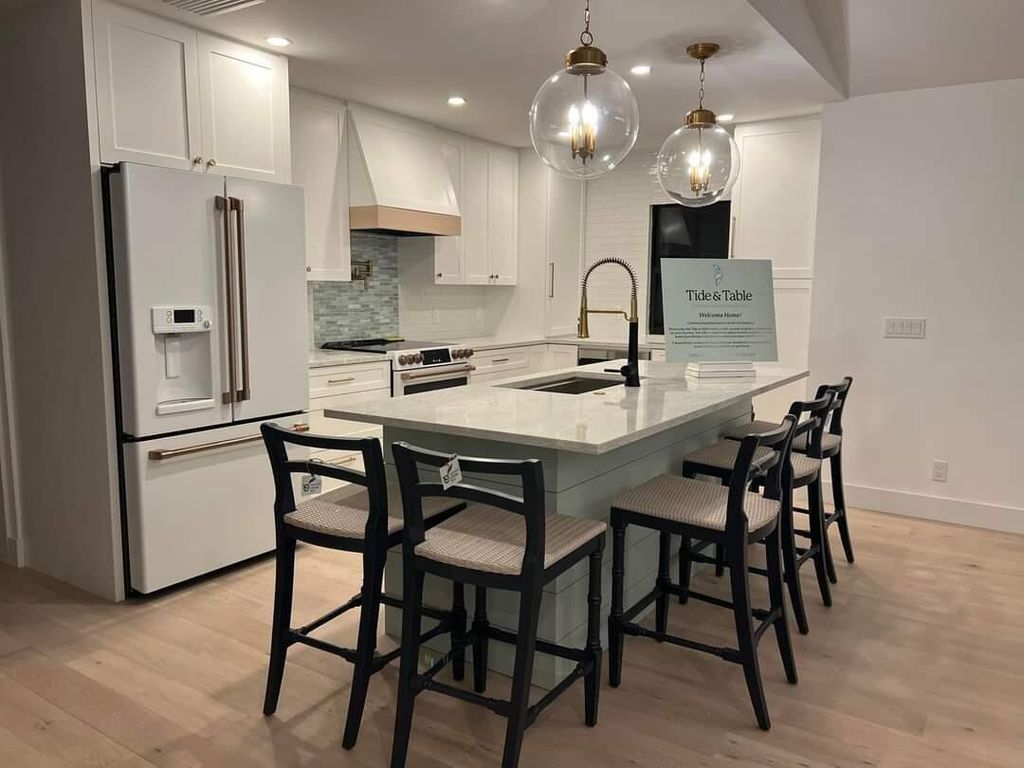 Photo of 96 Pine Hill Trail E, Tequesta, FL 33469 (MLS # R11118445)