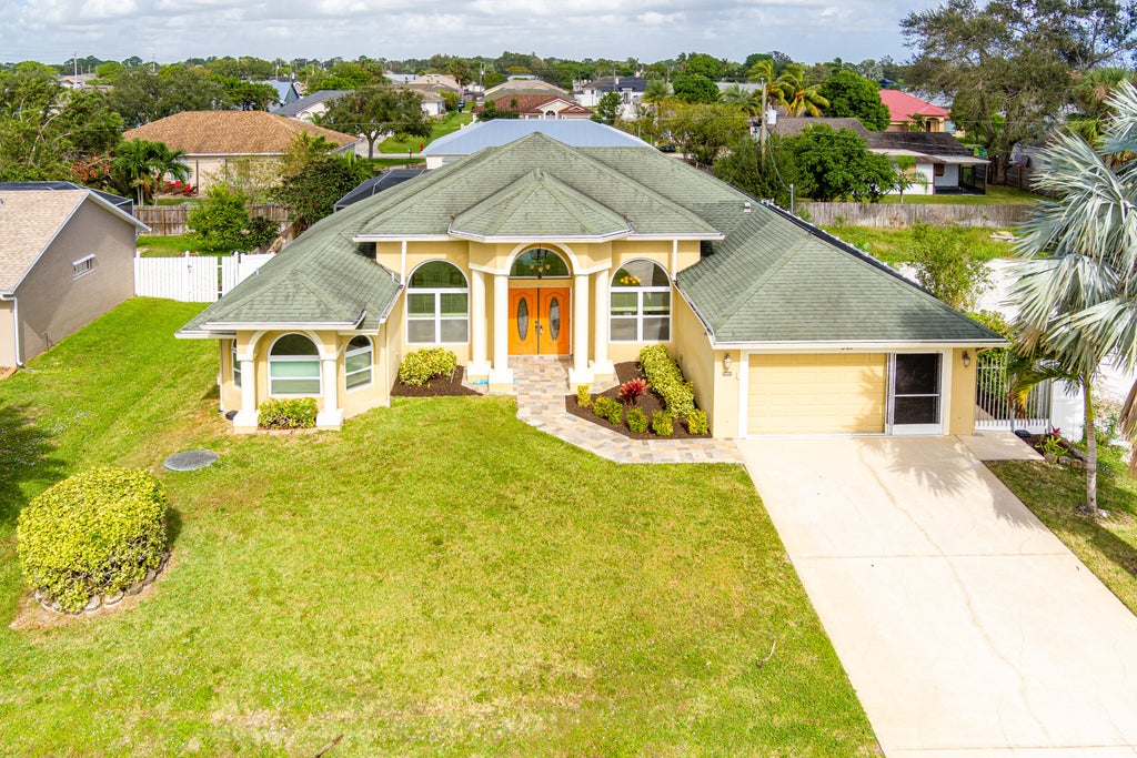 Photo of 661 SW Seagull Terrace, Port Saint Lucie, FL 34953 (MLS # R11033751)