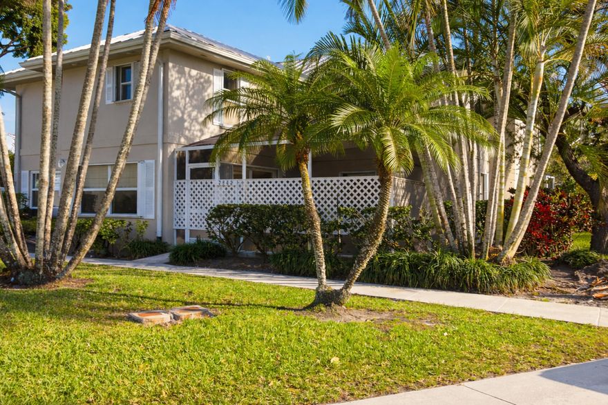 This renovated townhouse has been thoughtfully updated from top to bottom with a fresh, coastal feel. Laminate flooring flows throughout, leading into a bright, open kitchen with quartz countertops, stainless steel appliances, and a redesigned layout with a separate island—perfect for everyday living and easy entertaining.  The living room has been thoughtfully customized with a lowered ceiling to accommodate updated electrical, added high hat lighting, and a ceiling fan, creating a cozy and functional space to relax. Bathrooms have been refreshed with new vanities and flooring. Closets are upgraded with built-in organization and barn doors, accordion shutters offer peace of mind, and the big updates are already done—AC 2019, water heater 2023 and roof 2018. Bonus: HOA includes wifi and cable and it is close to all shopping and major highways, making life just a little easier.  Move-in ready. Well cared for. Easy to love.