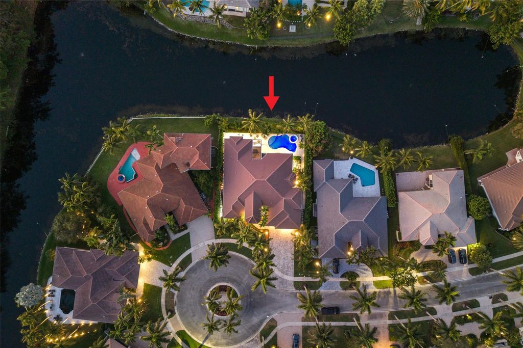 Photo of 317 Windmill Palm Avenue, Plantation, FL 33324 (MLS # F10488356)