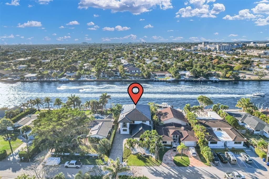 Photo of 319 S Riverside Drive, Pompano Beach, FL 33062 (MLS # F10551185)