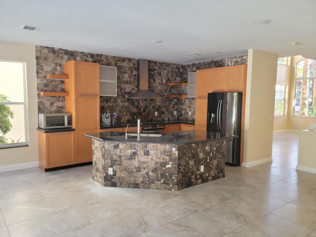 Photo of 4045 Arthurium Avenue, Lake Worth, FL 33462 (MLS # R10863240)