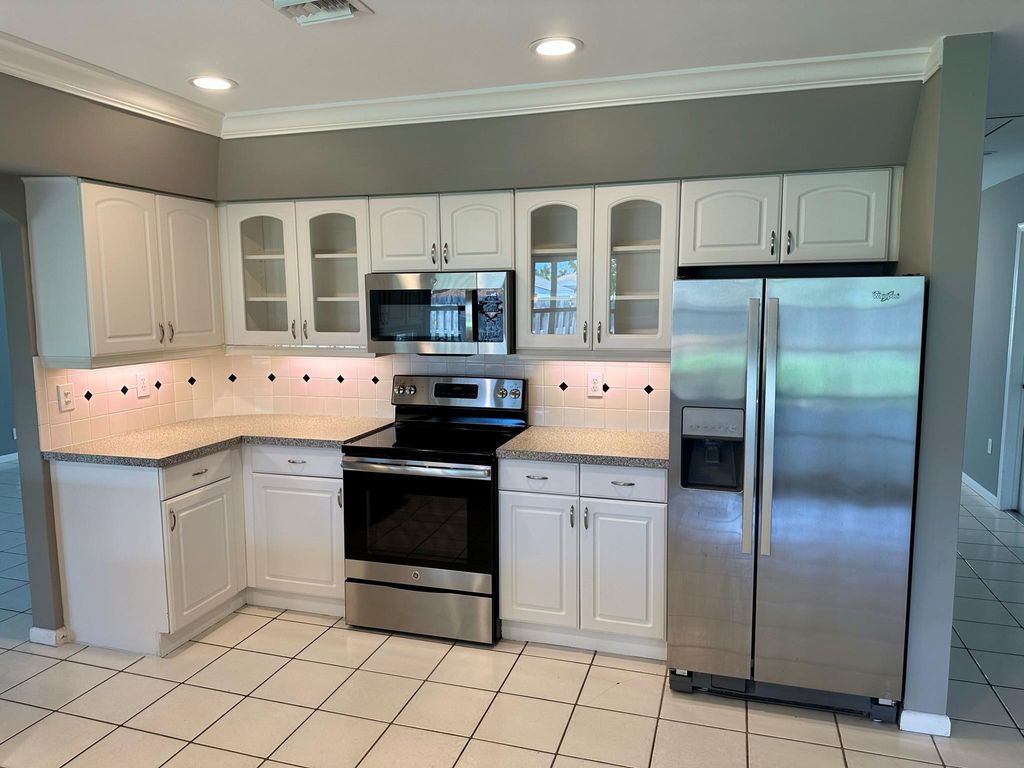 Photo of 1357 NW 14th Court, Boca Raton, FL 33486 (MLS # F10496168)