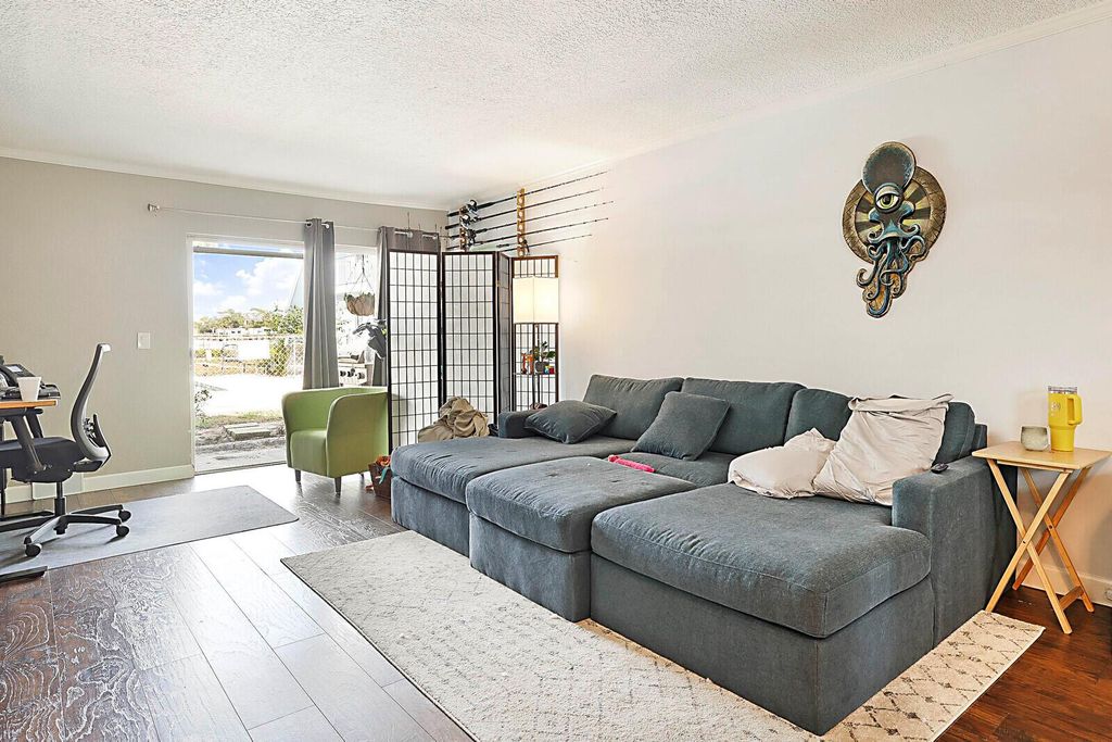 Photo of 725 Hummingbird Way #106, North Palm Beach, FL 33408 (MLS # R11106340)