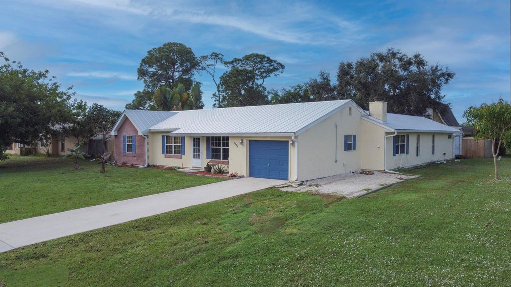 Photo of 2026 SE Triumph Road, Port Saint Lucie, FL 34952 (MLS # R10938202)