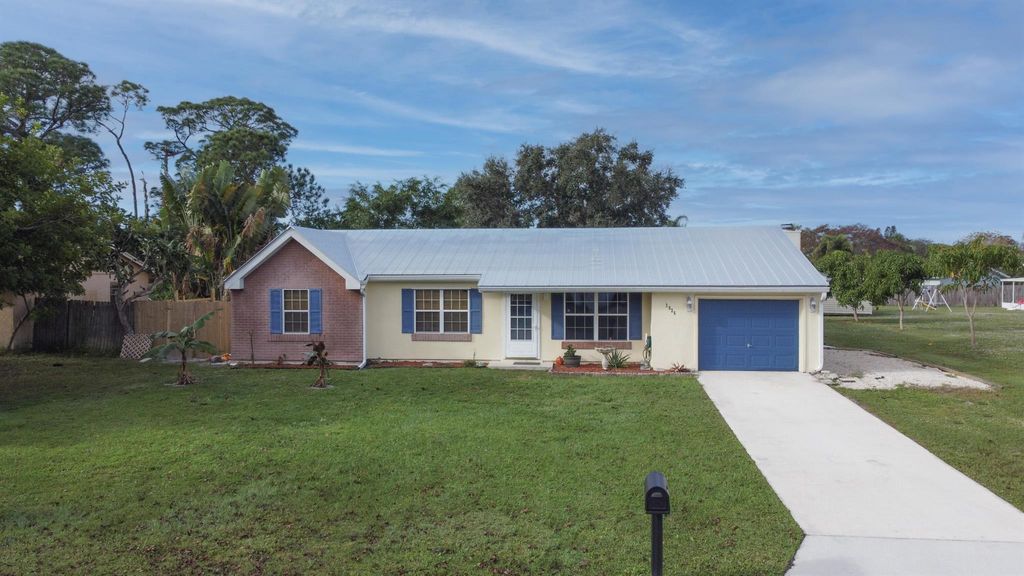Photo of 2026 SE Triumph Road, Port Saint Lucie, FL 34952 (MLS # R10938202)