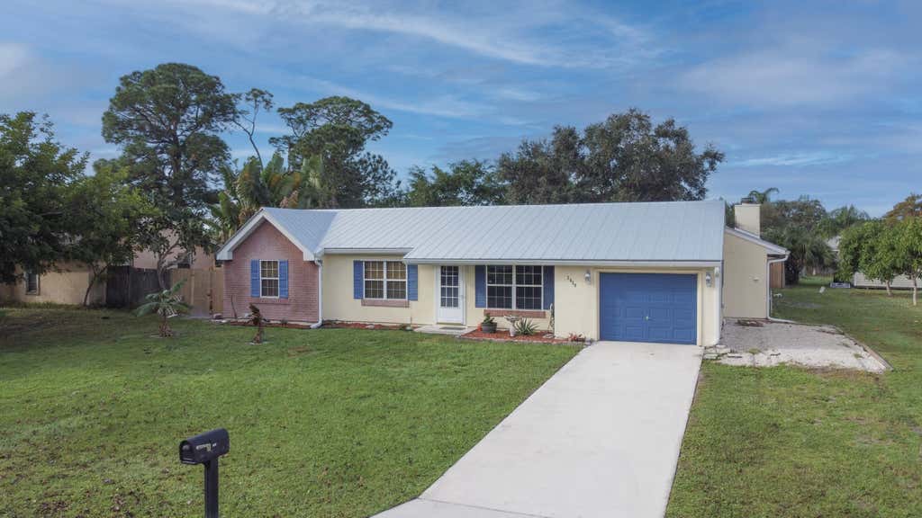 Photo of 2026 SE Triumph Road, Port Saint Lucie, FL 34952 (MLS # R10938202)